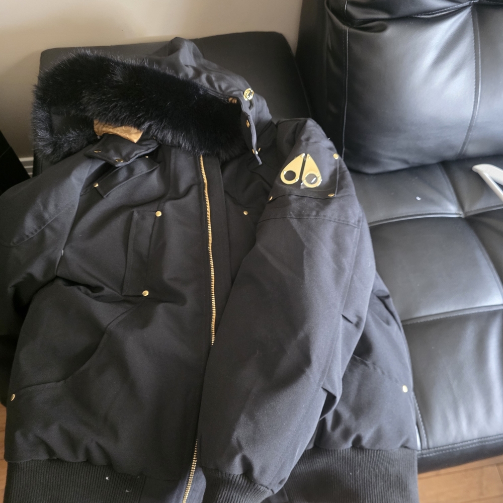 Moose Knuckles Black and Gold Puffer Jacket
